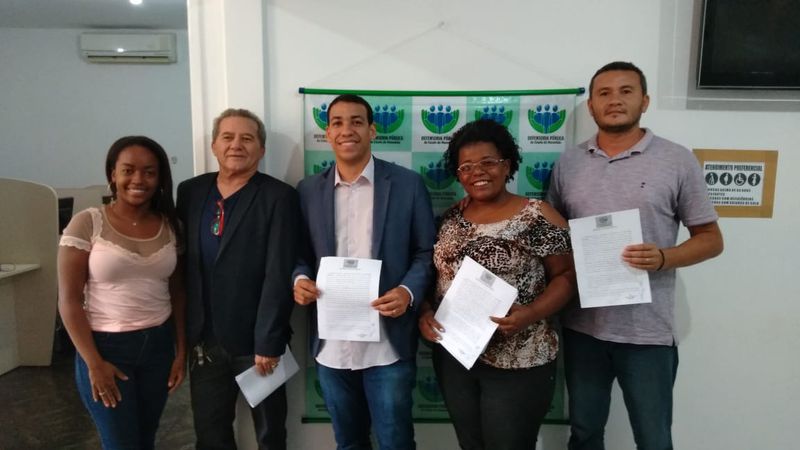 Representantes da prefeitura, coorpercarim e defensoria pública após acordo. Foto: Divulgação